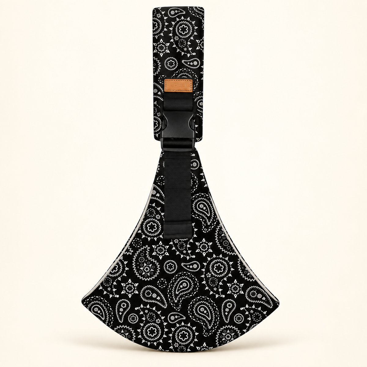 Black paisley baby sling carrier with black buckle and white piping