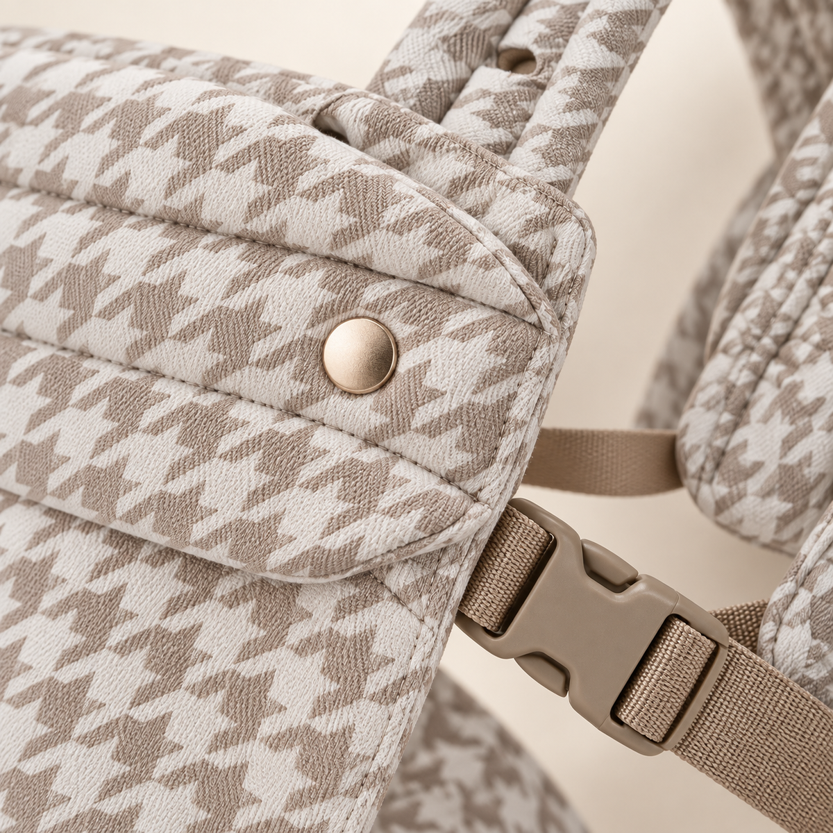 Khaki Houndstooth carrier fabric, snap, buckle, and stitching detail