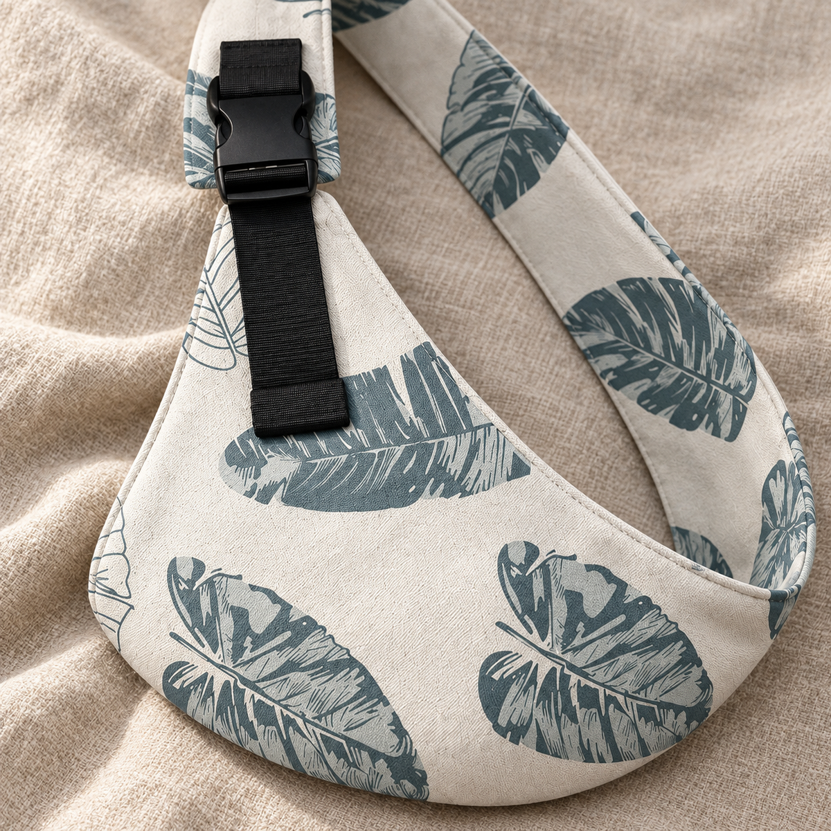 Indigo Blue Botanical Leaf Baby Sling Carrier – close-up fabric, buckle and strap detail