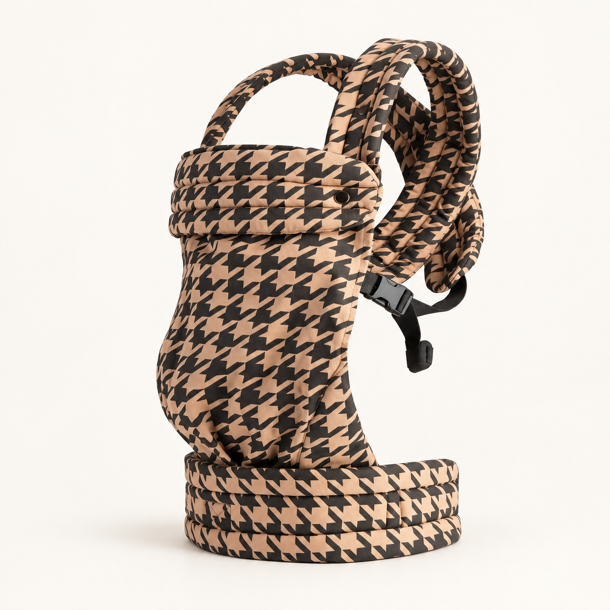 Noir Houndstooth ergonomic baby carrier in tan and black, studio product view