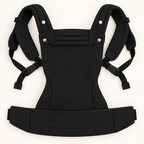 Née Onyx Black baby carrier opened to show straps, buckles and padded waistband