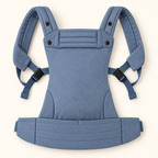 Née Powder Blue baby carrier opened to show straps, buckles and padded waistband