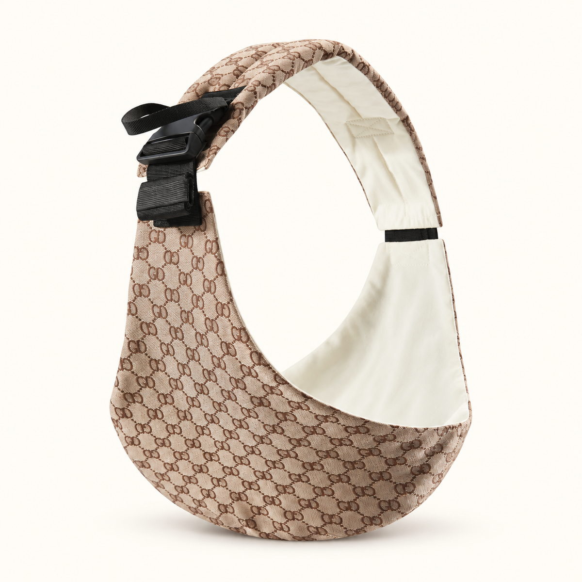 Sand beige patterned baby sling carrier with cream lining and black buckle