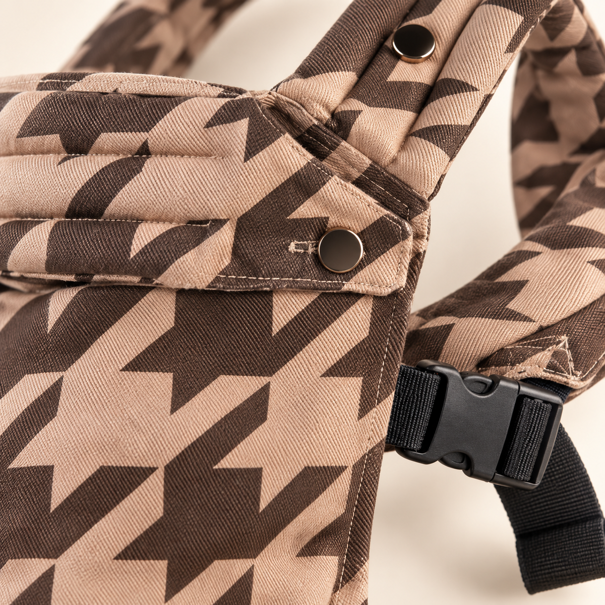 Stone Houndstooth Grey carrier fabric, snap, buckle, and stitching detail